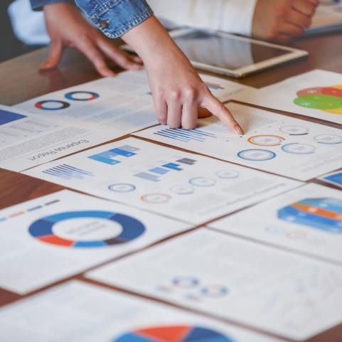 papers charts laying on desk