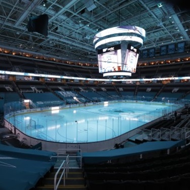 SAP center with lights low and rink illuminated