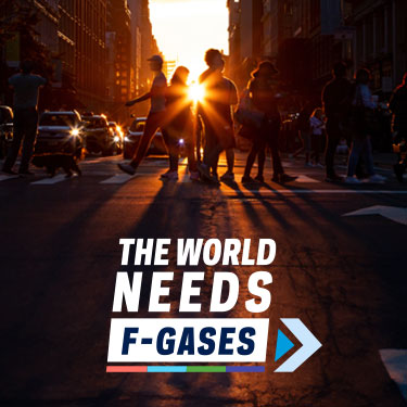 The world needs f-gases phrase over people walking through an intersection